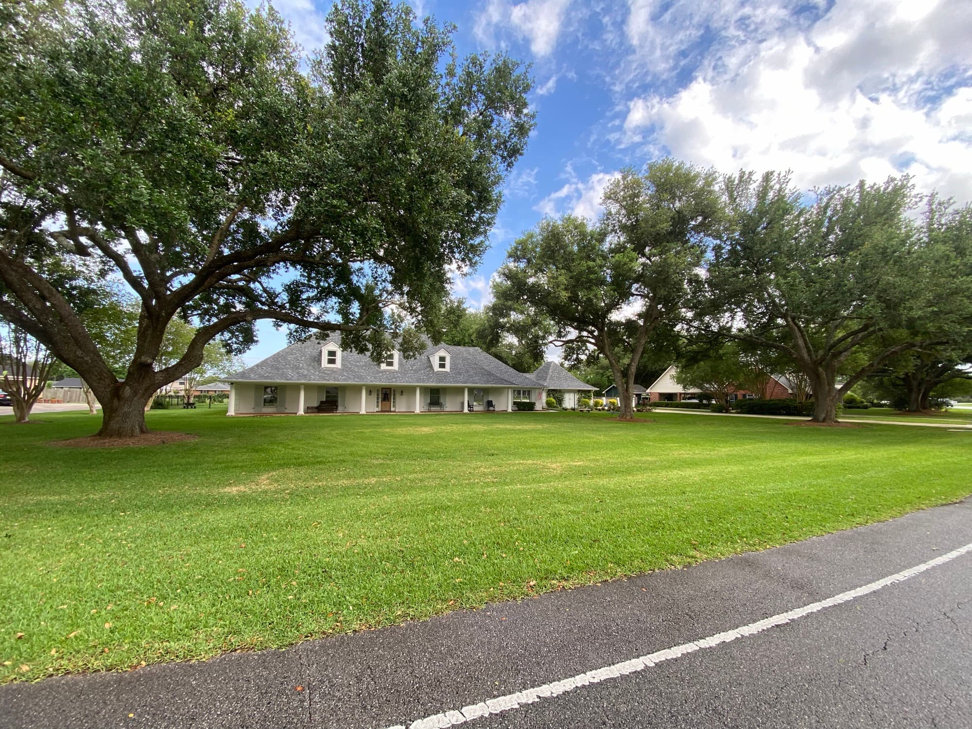Restored land under massive oaks in Thibodaux, Louisiana by TIMCO